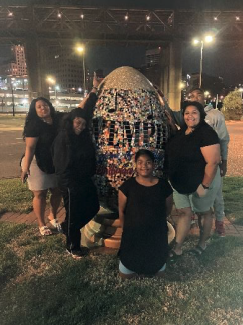 group with ornate egg sculpture