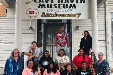 African American history group on steps of museum
