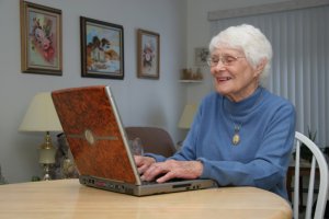 Elderly Woman Taking Online Course