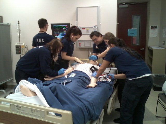 EMS Students working on SIM man