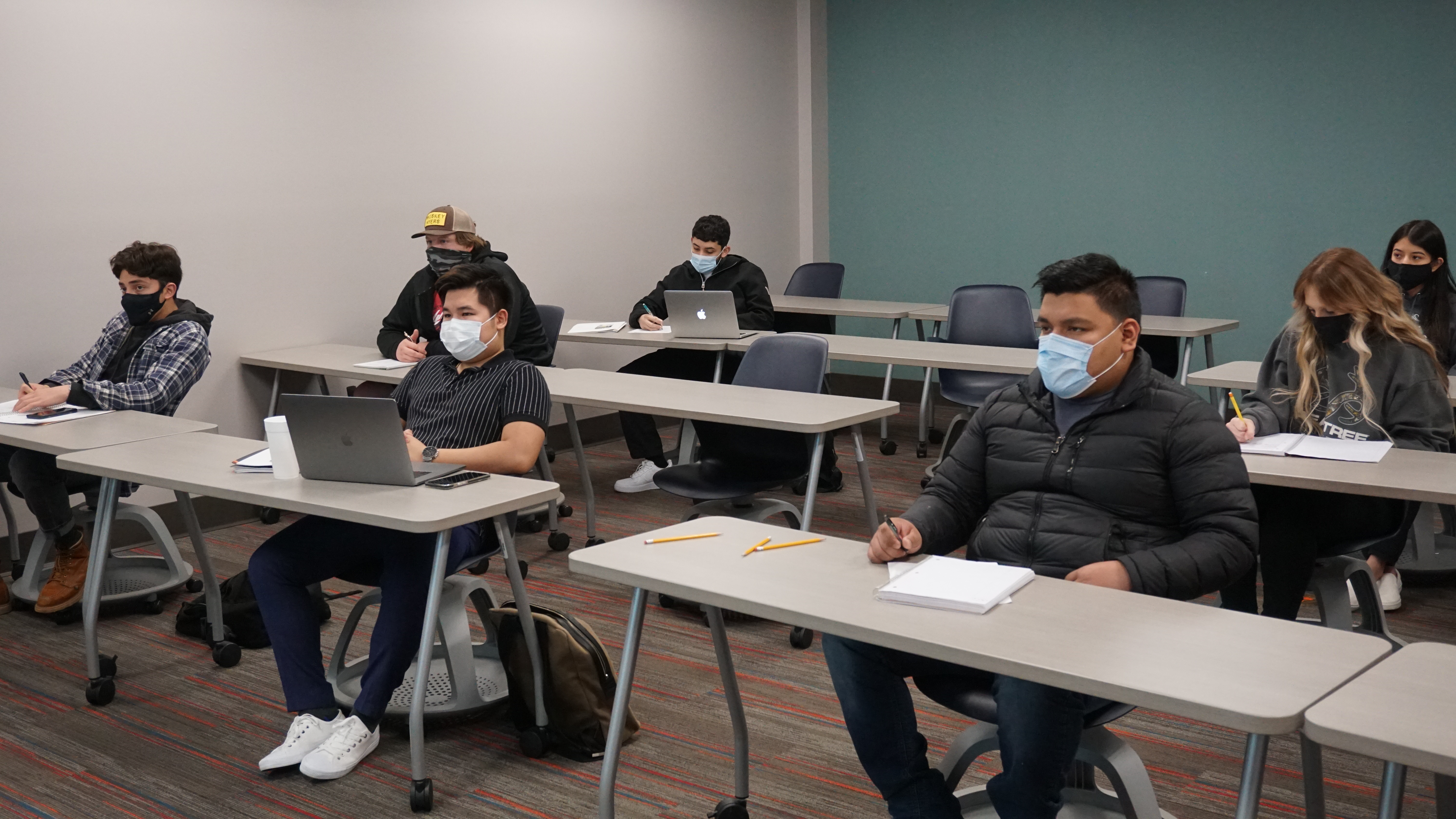 students in classroom wearing masks
