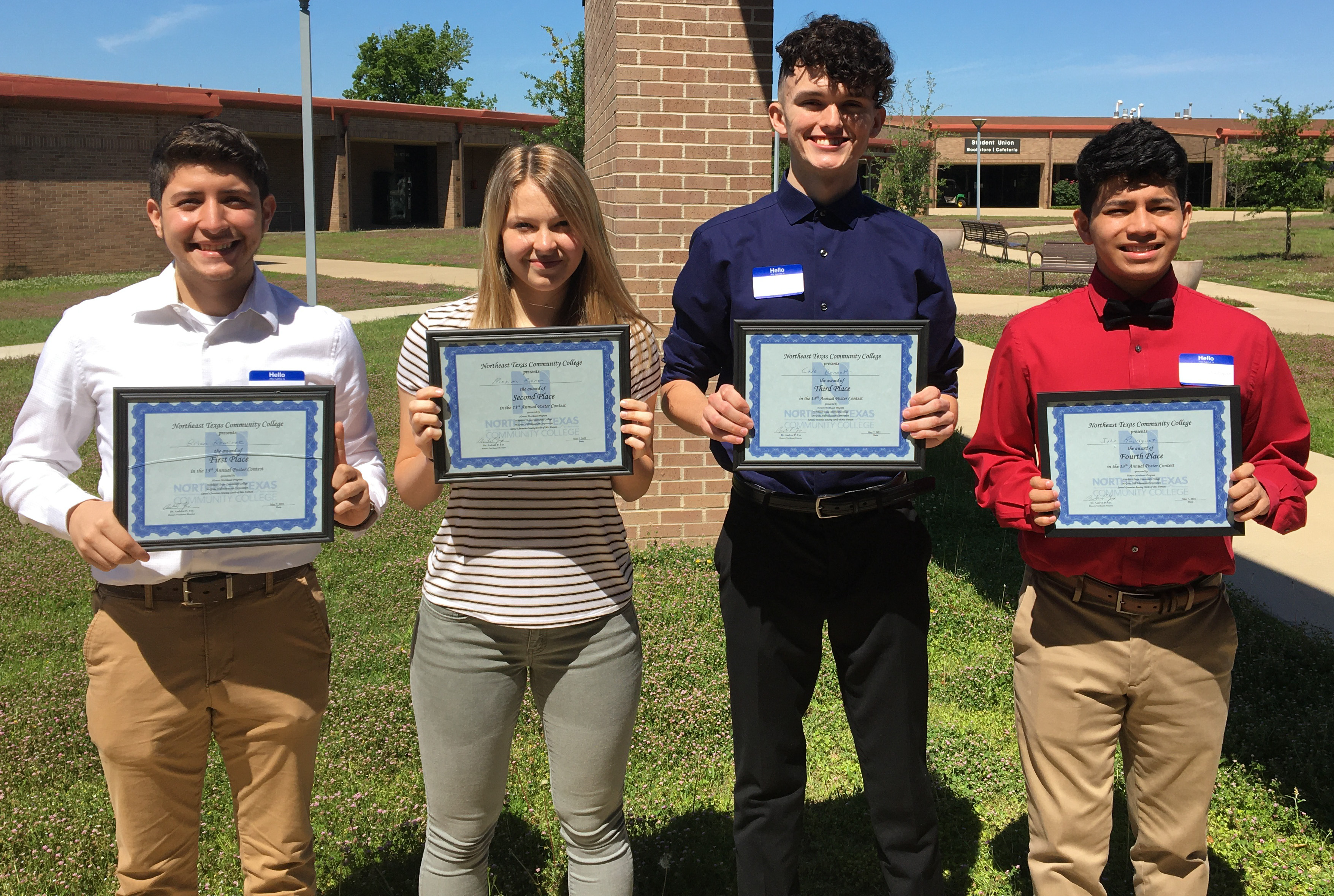 winners posed with certificates