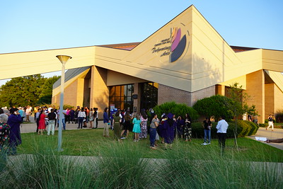 graduates outside Whatley Center