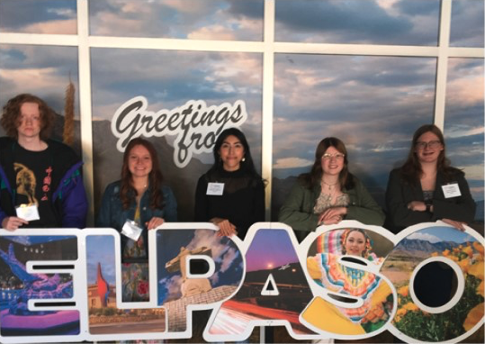 students behind El Paso sign