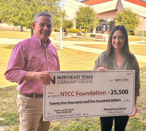 black scholarship check presentation