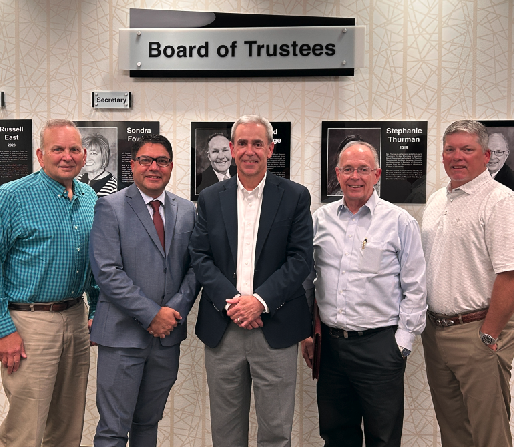 Rose with board members