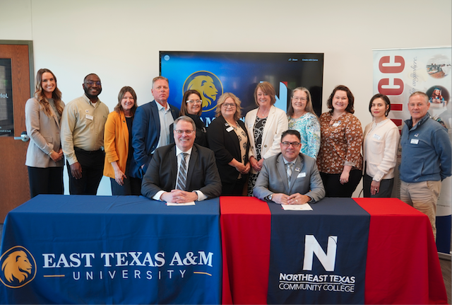 ETAMU signing group photo