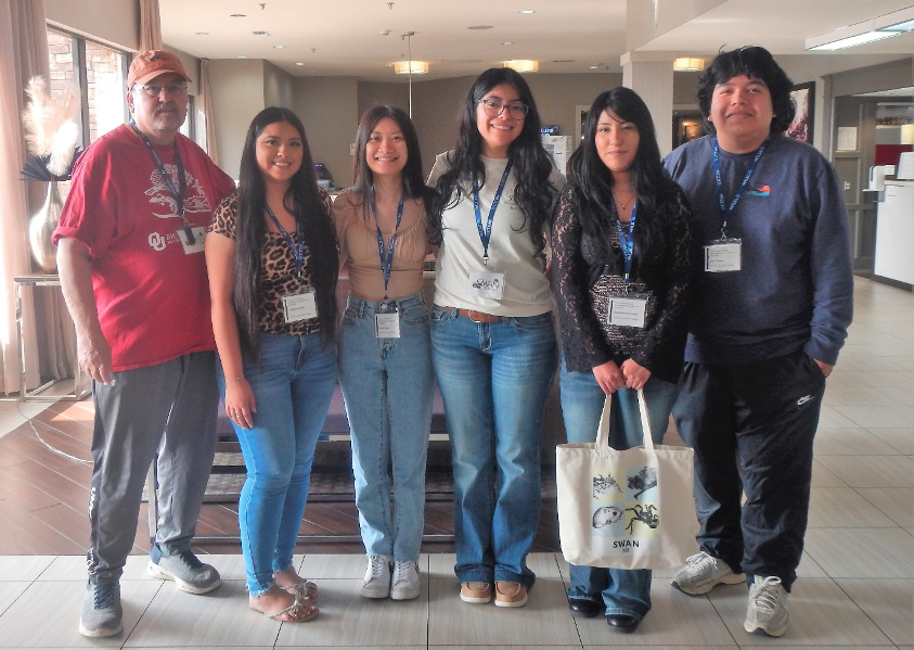 biology students at conference
