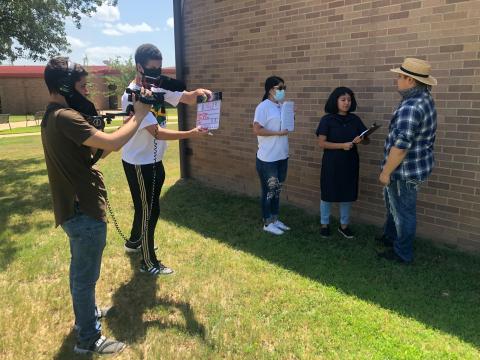 students filming