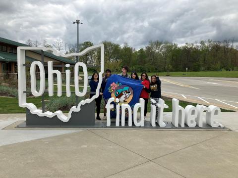 students with ohio sign