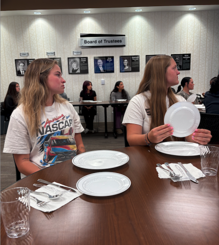 students learning dining manners