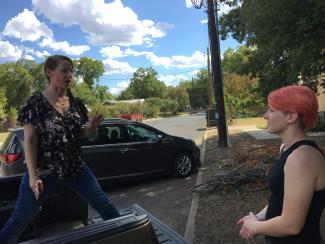 On the scene in Fredericksburg on her pickup truck, discussing costumes with another talented student of costume design, Hope Kelly.