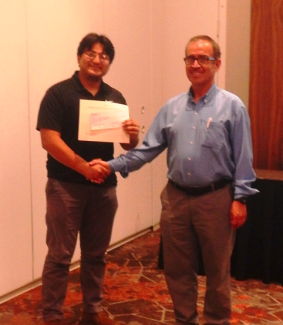 Miachael Rodriguez receiving grant