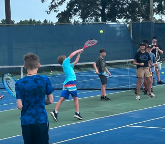 kids playing tennis