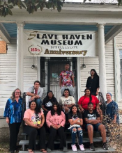 African American history group on steps of museum