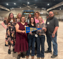 ag group holding banner