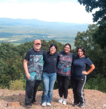 students with professor at overlook