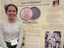 Mendoza in front of research poster