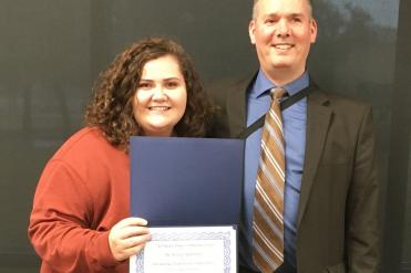 Lauren Southerland pictured with Professor John Russo