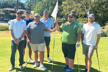 texas heritage national bank team on golf course