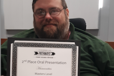 Brandon Pettey with certificate