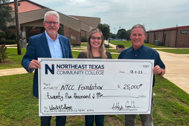 big check presentation for grant