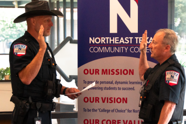 Radke swears in Russell Taylor