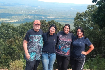 students with professor at overlook