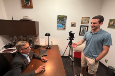 student interviewing Dr. Yox