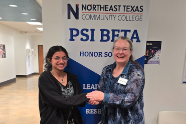 patel receiving scholarship