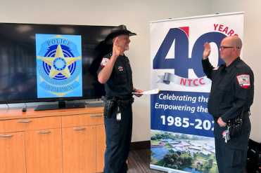 Weisinger being sworn in