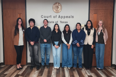 criminal justice class in front of court of appeals sign