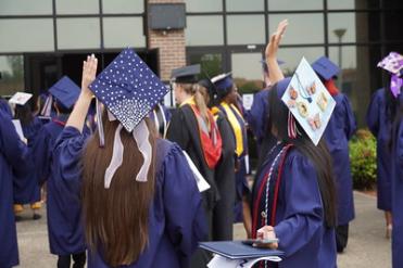 girls in graduation caps