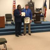 McCowan receiving award