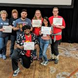 Smith with students at 2019 TIPA conference