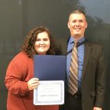 Lauren Southerland pictured with Professor John Russo