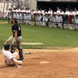 baseball player sliding home