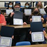 outstanding psychology students with certificates