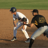 NTCC player leading off first.