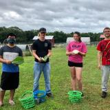 students working on farm