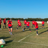 men's soccer doing drills