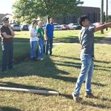 students throwing spears