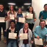 psi beta inductees with certificates