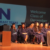 grads on stage