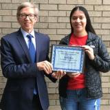 Perez receiving certificate