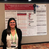 Velasquez with poster