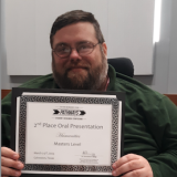 Brandon Pettey with certificate