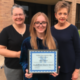 Chitsey winner with professors