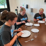 students learning table manners