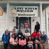 African American history group on steps of museum